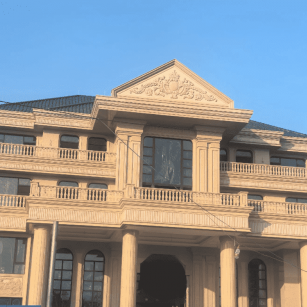 扬州黄金麻别墅外墙干挂石材效果示例