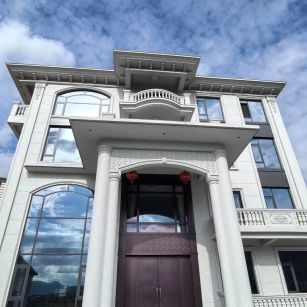 扬州白麻别墅外墙干挂石材效果示例