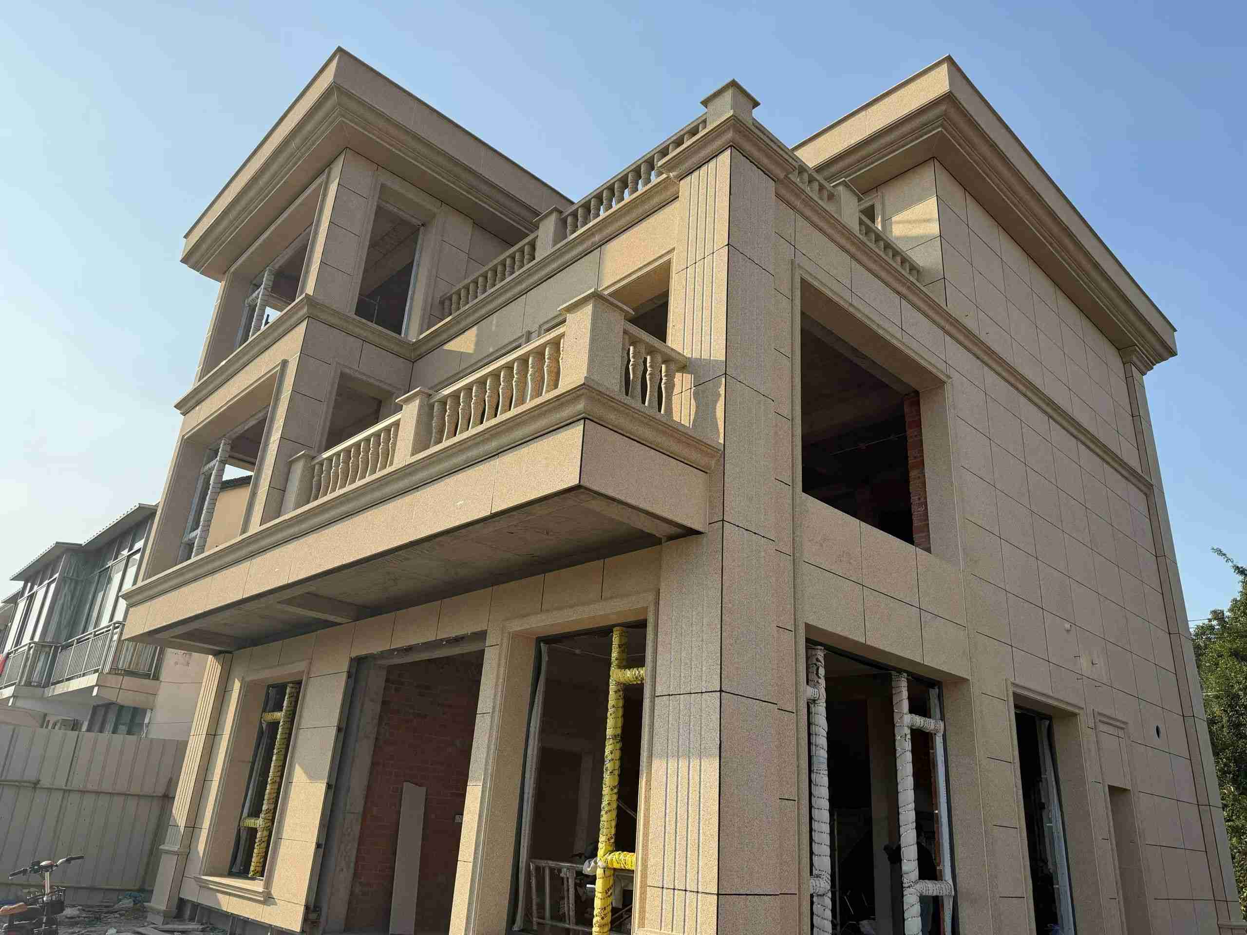 扬州 黄金麻花岗岩石材荔枝面外墙干挂效果展示